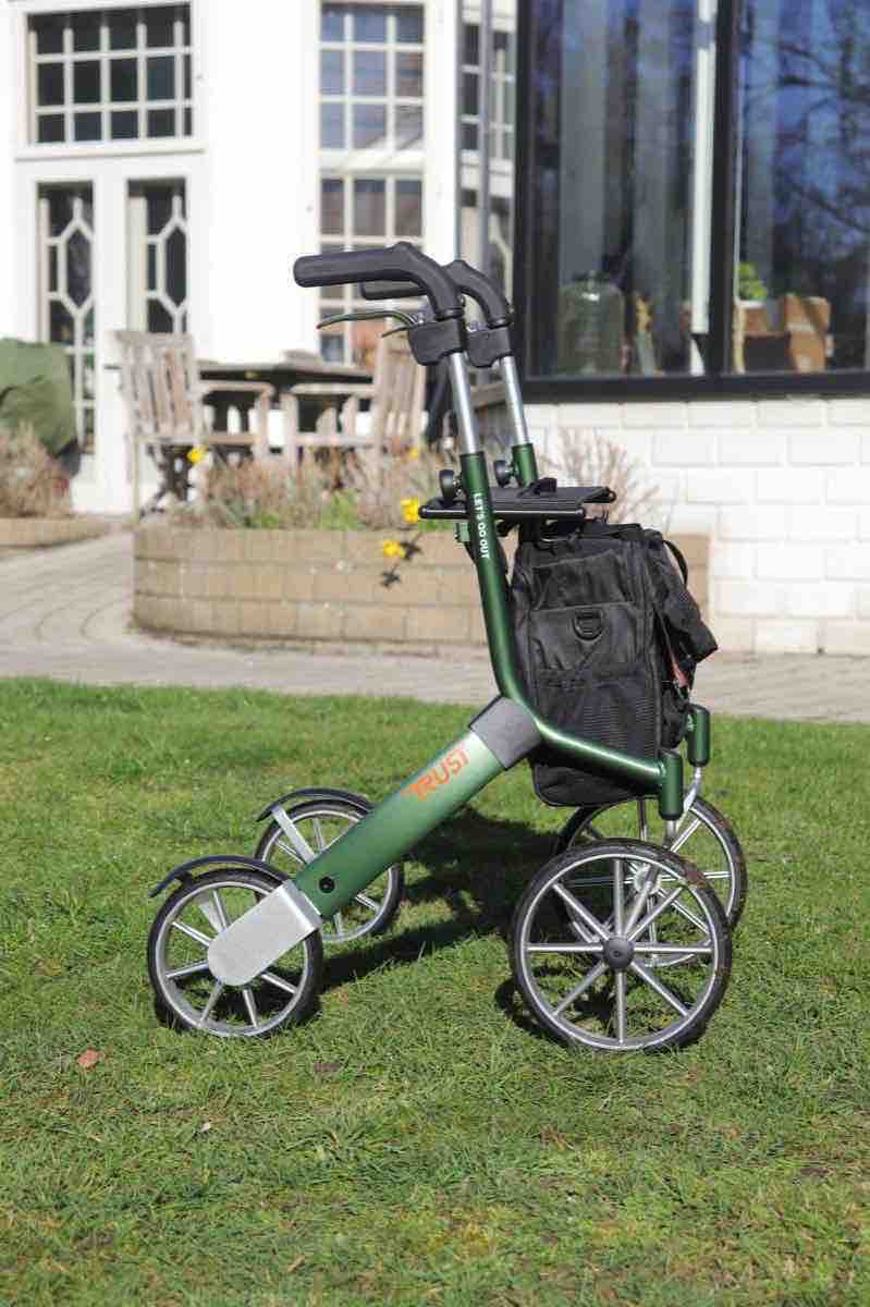 Rollator walker used outdoors on grass