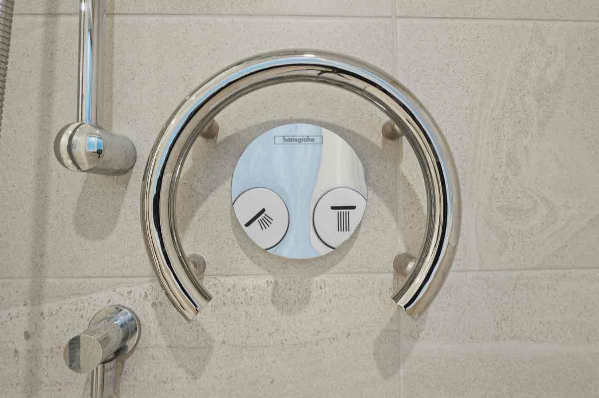 Shower with circular grab bar support